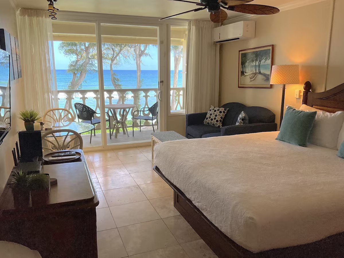 Oceanfront studio at Islander on the Beach Unit 325 with a king bed and lanai view